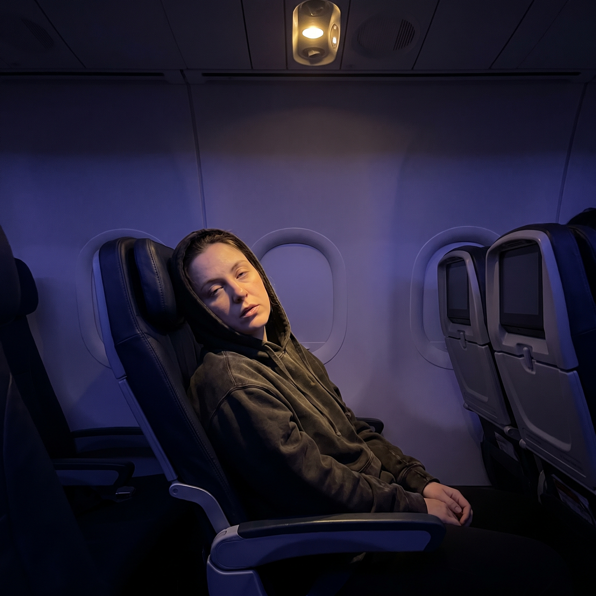Traveler unable to sleep on a night flight
